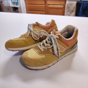 New Balance 574 yellow, orange, gold